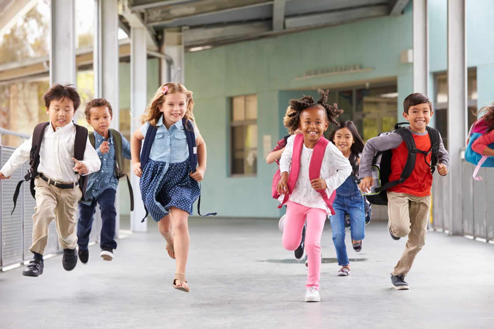 group of elementary school kids running in a PLTW3AL